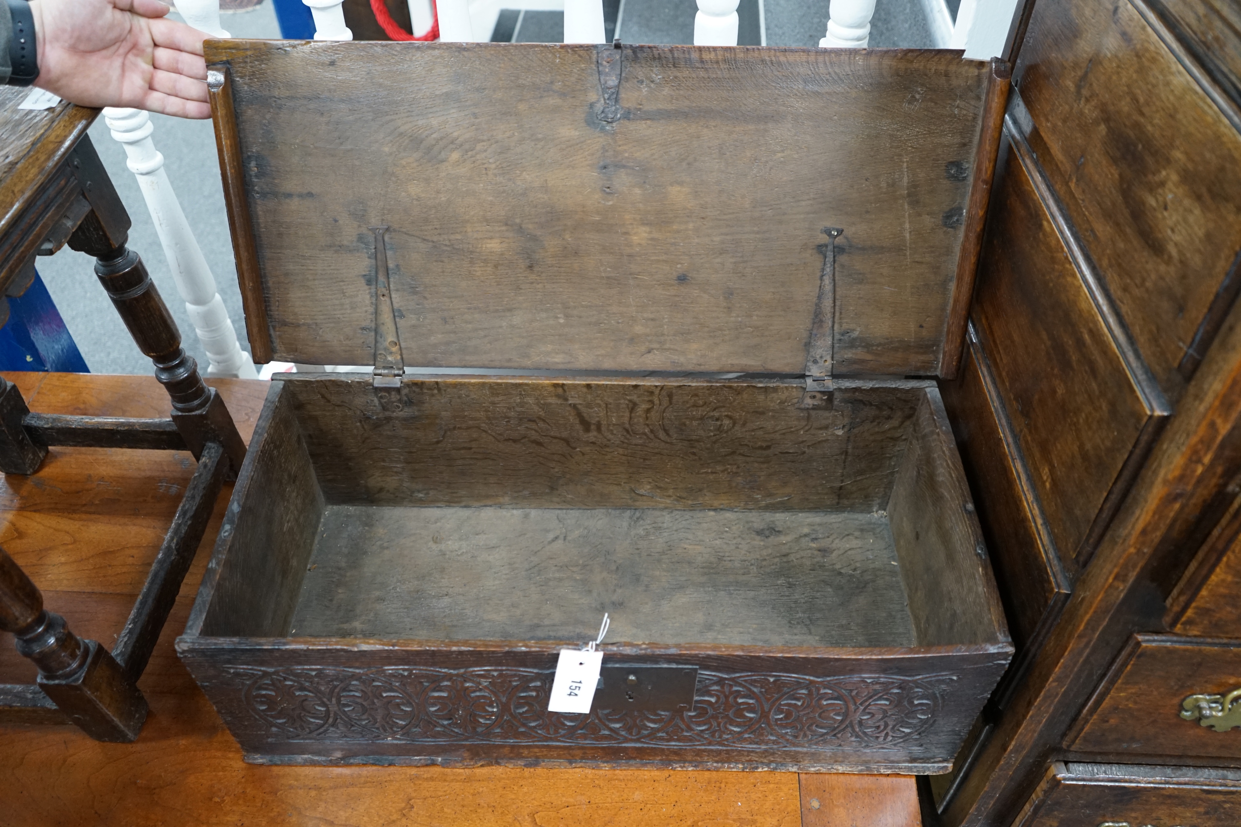 A 18th century shallow carved oak coffer, width 74cm depth 32cm height 24cm